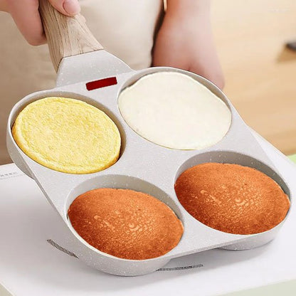 Crêpière dans une main