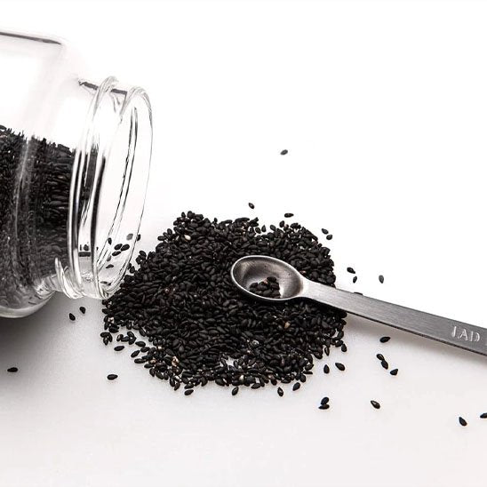 Cuillère doseuse avec des gaines de chia