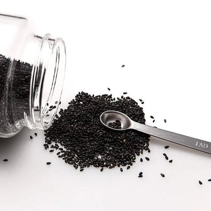 Cuillère doseuse avec des gaines de chia