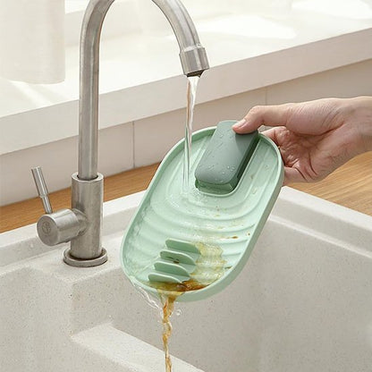 Repose cuillère​ sous l'eau pour le nettoyage